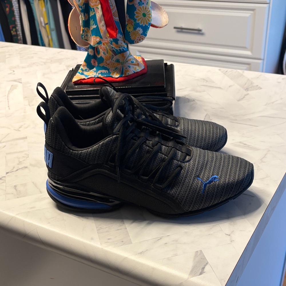 Puma Men's Black Athletic Sneakers with Blue Logo Accents